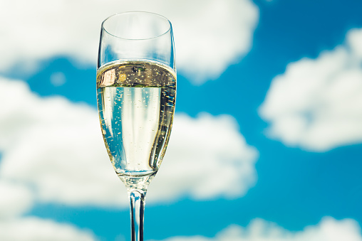 Glasses of sparkling wine on a tray