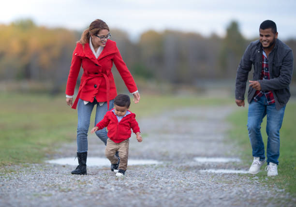 istock Family going for a post-rain walk in the fall 1265317938