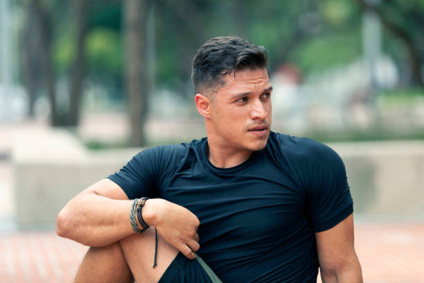 Young man exercising outdoors. Sports lifestyle.