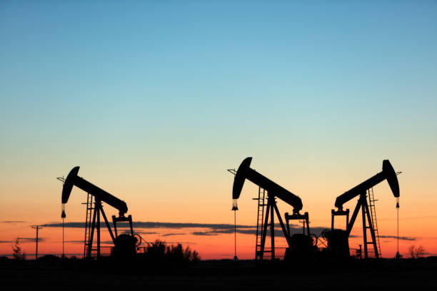 istock Prairie Oil Pump Jacks Canada USA 1265348666