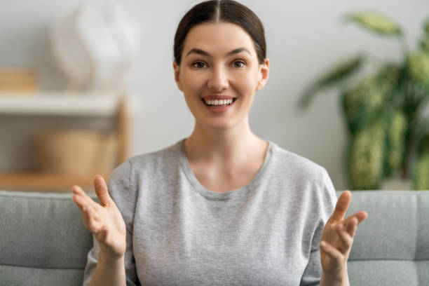 istock Young woman is chatting with somebody. 1265367948