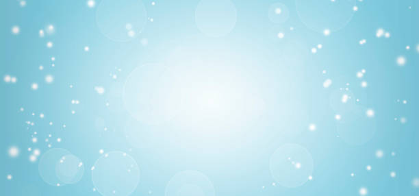 istock White lights bokeh, defocus glitter blur on blue background. copy space. illustration. 1265393402