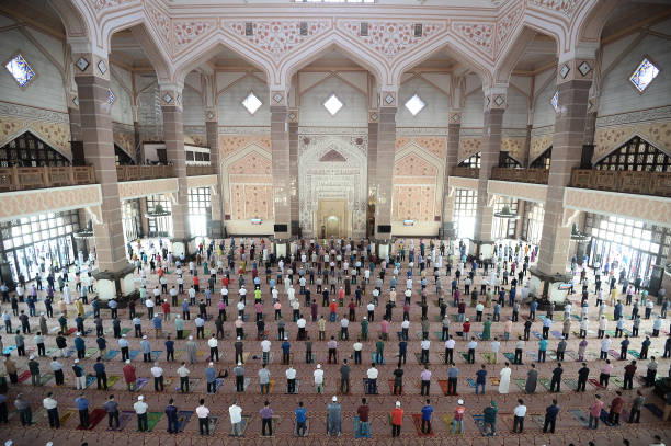 istock Friday prayer in malaysia during Covid-19 1265395956