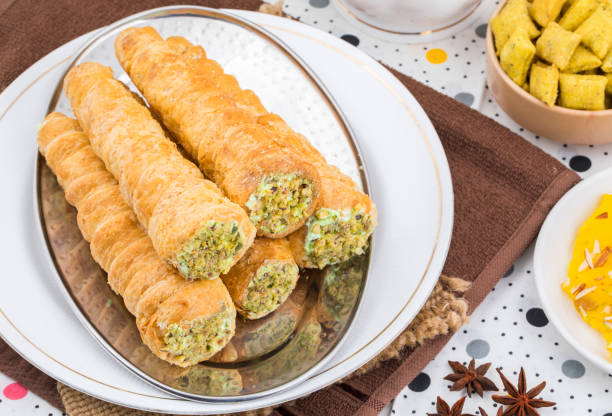 istock Indian Sweet Bakery Food Puff Roll with Cream 1265398277