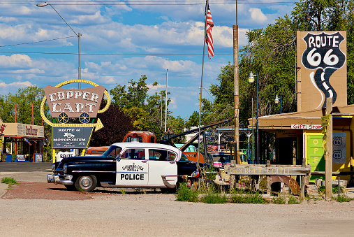 Seligman, Arizona, USA - July 30, 2020: The “Copper Cart” and “Route 66” Gift Shops are well-known landmarks and popular tourist stops along historic Route 66 in the heart of Seligman, Arizona.