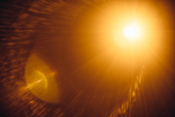 istock Abstract Natural Sun flare on the black 1265400100
