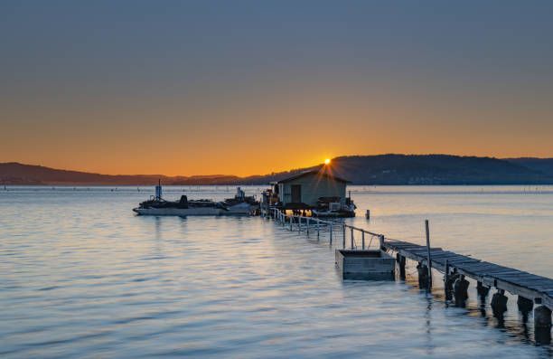 istock Sunburst over the Oyster Shack 1265402169
