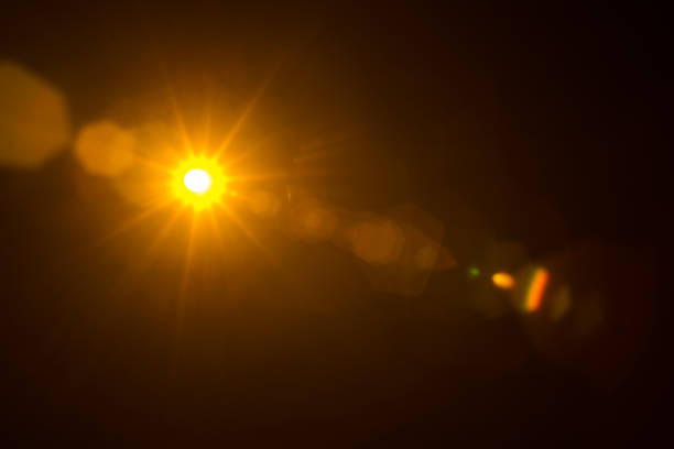 istock Abstract Natural Sun flare on the black 1265404251