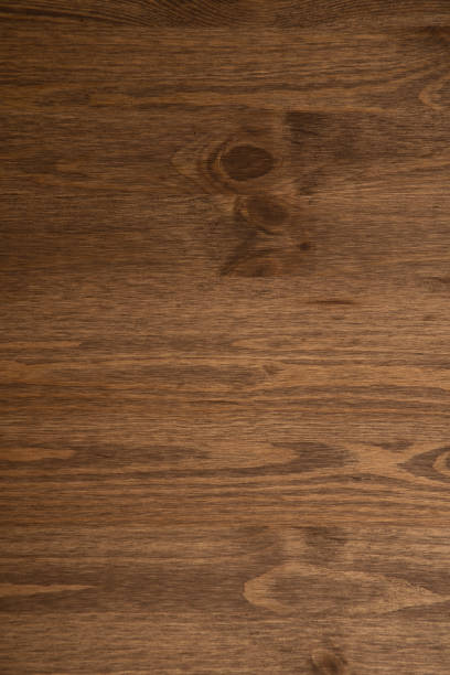 istock Dark Brown wood plank wall texture background 1265408578