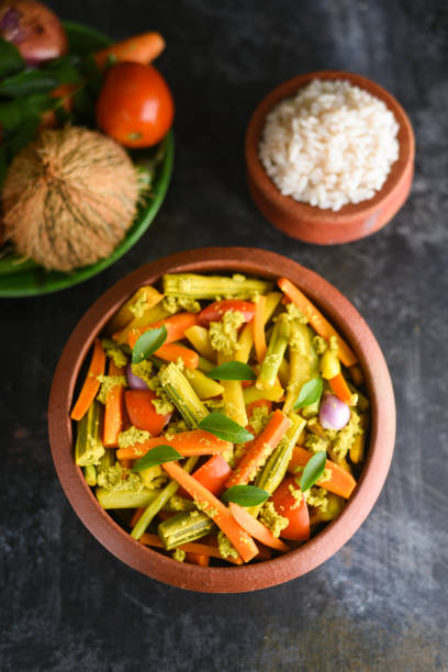 istock Aviyal and rice Kerala mixed vegetable curry with grated coconut 1265412254