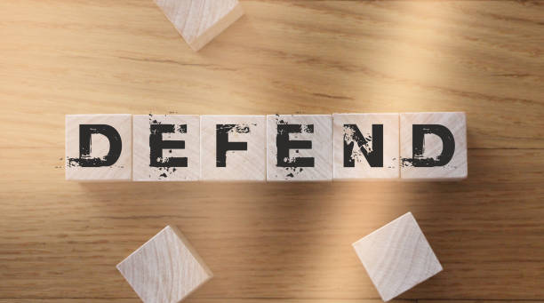 istock Defend word on wooden cubes 1265424191