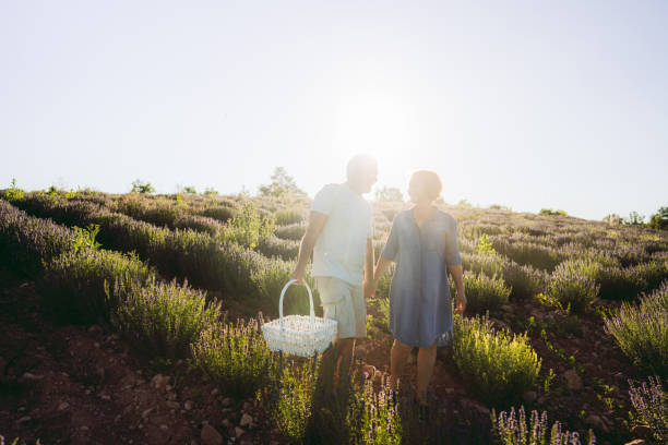 istock Senior couple having a walk on lavander plantations 1265425476