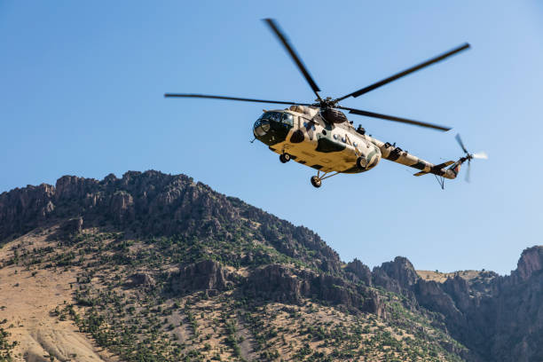istock Transport Helicopter in flight 1265429591