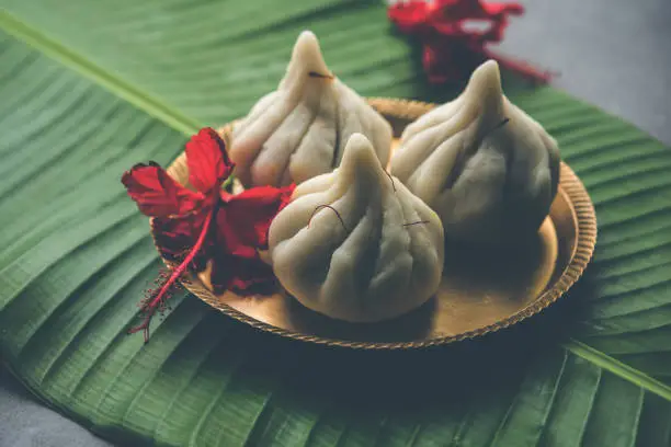 Ukdiche Modak are steamed dumplings with an outer rice flour dough and a coconut-jaggery stuffing, Indian food offered to lord ganesha on Chaturthi