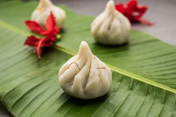 Ukdiche Modak are steamed dumplings with an outer rice flour dough and a coconut-jaggery stuffing, Indian food offered to lord ganesha on Chaturthi