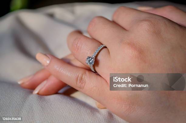 Wedding Rings Together In Hands Stock Photo - Download Image Now - Gold - Metal, Ring - Jewelry, Adult