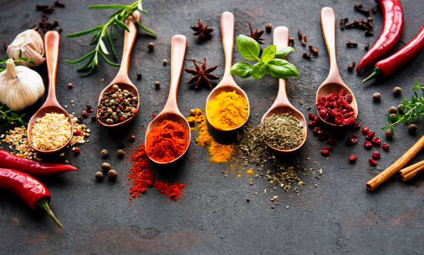 istock Assortment of spices on black 1265438734