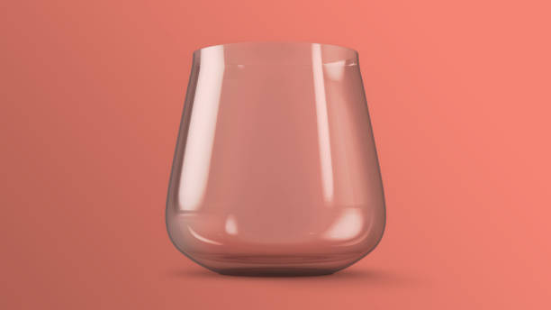 istock Glass of water on pink background 1265438901