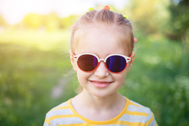 istock Little girl in nice sunglasses 1265438924