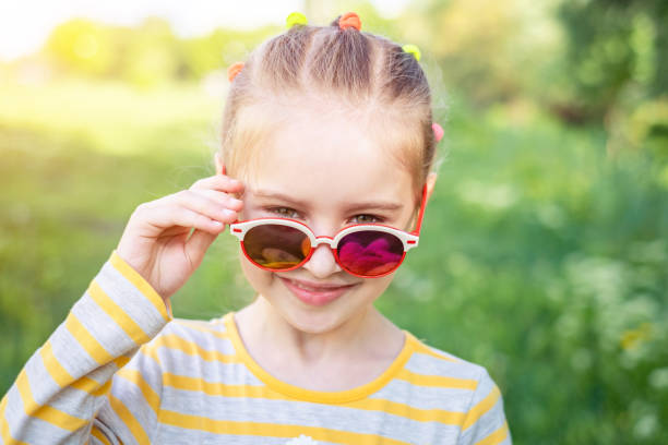 istock Little girl in nice sunglasses 1265438934