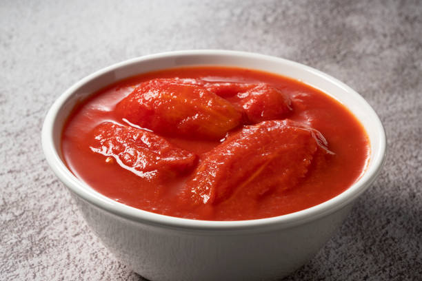 istock Tomato puree in a white bowl 1265440758