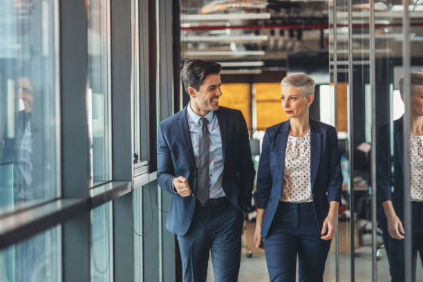 istock Business partners walking together 1265448886