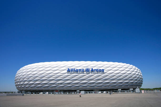 Munich, Germany - December 18, 2013: The football arena in Munich, Germany - special design and floated with white, red or blue light. The light depends on what kind of club is playing at night. This night was red time.