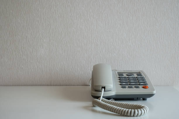 istock Telephone on the desk at gray wall background 1265451668