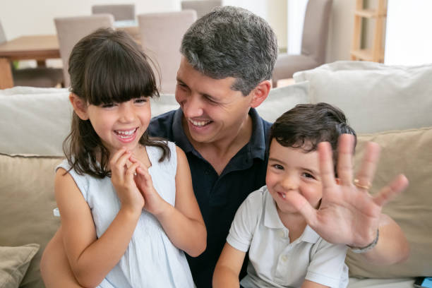 istock Happy dad enjoying time with kids 1265455994