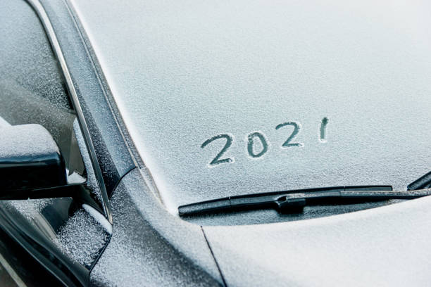 istock New year 2021 written on car windshield 1265460737