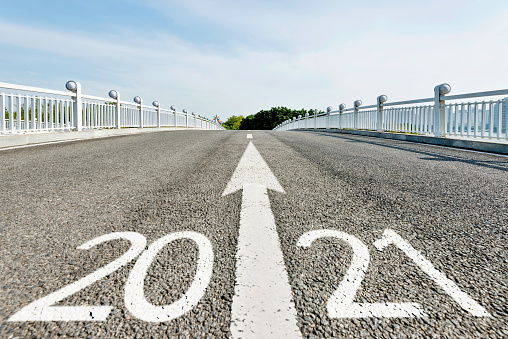 Number 2021 on asphalt pedestrian bridge