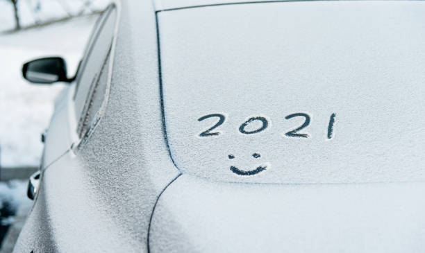 istock New year 2021 written on car windshield 1265465073
