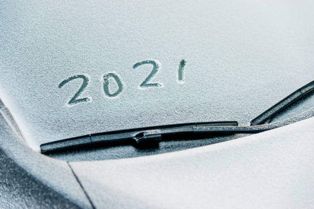 istock New year 2021 written on car windshield 1265465287