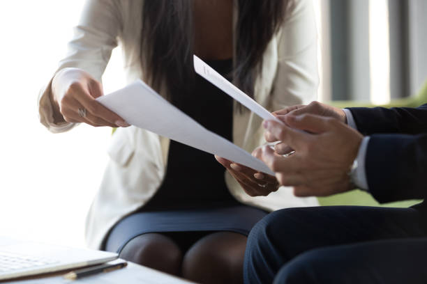 istock Close up businesswoman advisor consulting client, working with documents 1265470578