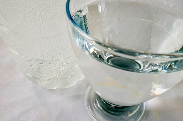 istock ready to drink water in glass cup 1265478387