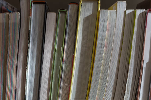 istock Close up of books on shelf 1265501162