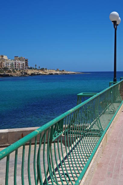 istock sidewalk by the sea, Marsaskala, Malta 1265501432