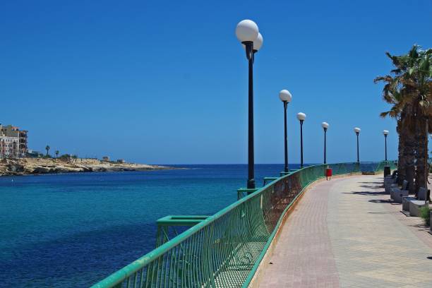 istock sidewalk by the sea, Marsaskala, Malta 1265501506