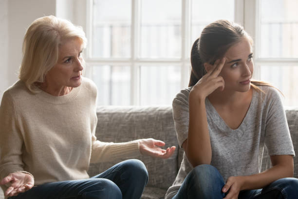 istock Elderly authoritative mom lecturing annoyed adult daughter 1265517405