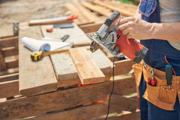 istock Builder getting ready for cutting wood outdoors 1265517950