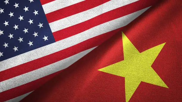 United States and Vietnam two folded flags together