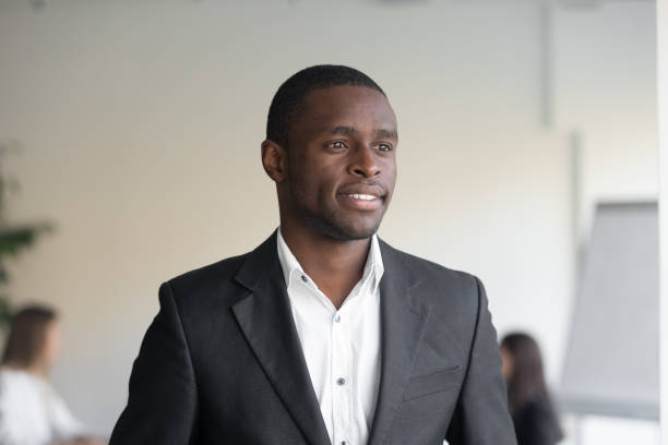 istock African American male look in distance dreaming or visualizing 1265522957