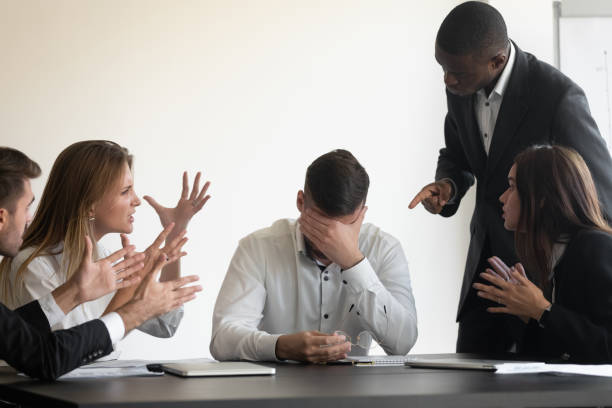 istock Stressed male ceo feel distressed with annoying employees 1265524571