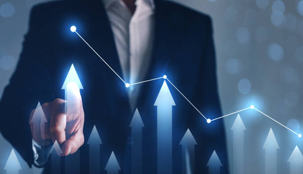 istock usinessman drawing on screen growing graph. Business development concept. 1265530445