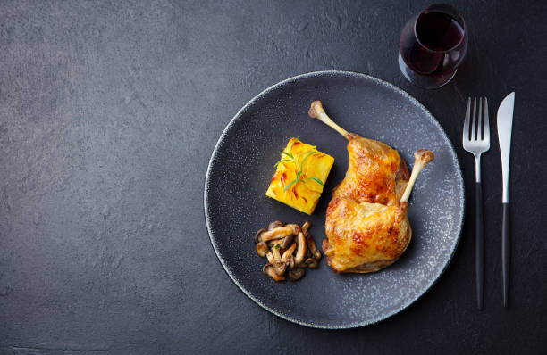 istock Duck legs confit with mushroom sauce. Copy space. Top view. 1265531152