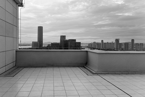 Empty rooftop in seaside city.
