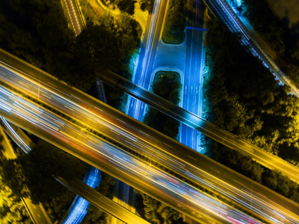 istock Aerial highway junction at night time 1265544340