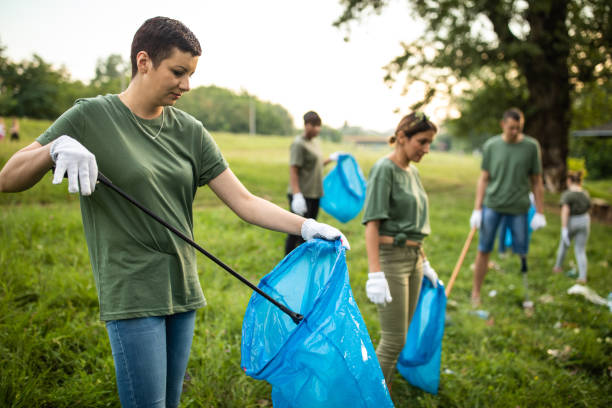 istock Dedicated environmental volunteers, cleaning nature together 1265548580