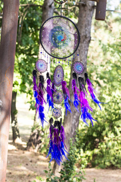 istock Handmade dream catcher with feathers threads and beads rope hanging 1265548608