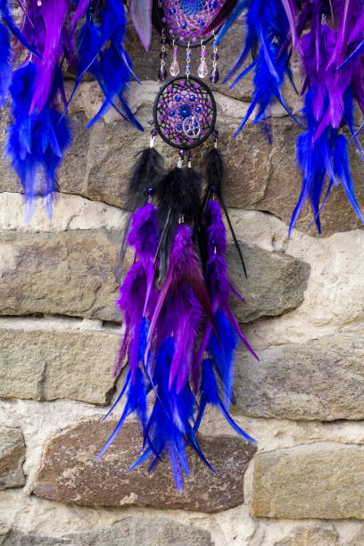 istock Handmade dream catcher with feathers threads and beads rope hanging 1265548756